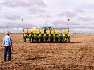 Mato Grosso, Brazil March 01, 2008. Tractor pulling a planter planting soy. soybean planting season in Mato Grosso, midwest of Brazil