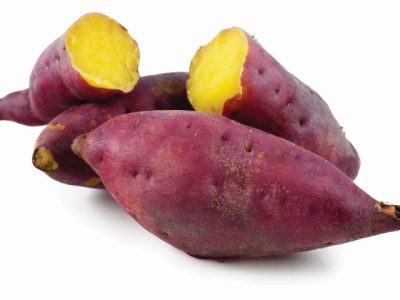 Sweet potatoes. Cooked whole and halved sweet potatoes.