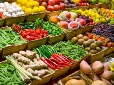 Fruit market with various colorful fresh fruits and vegetables