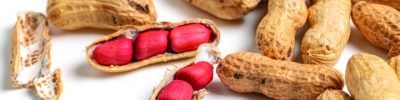 Raw nuts peanuts on white background